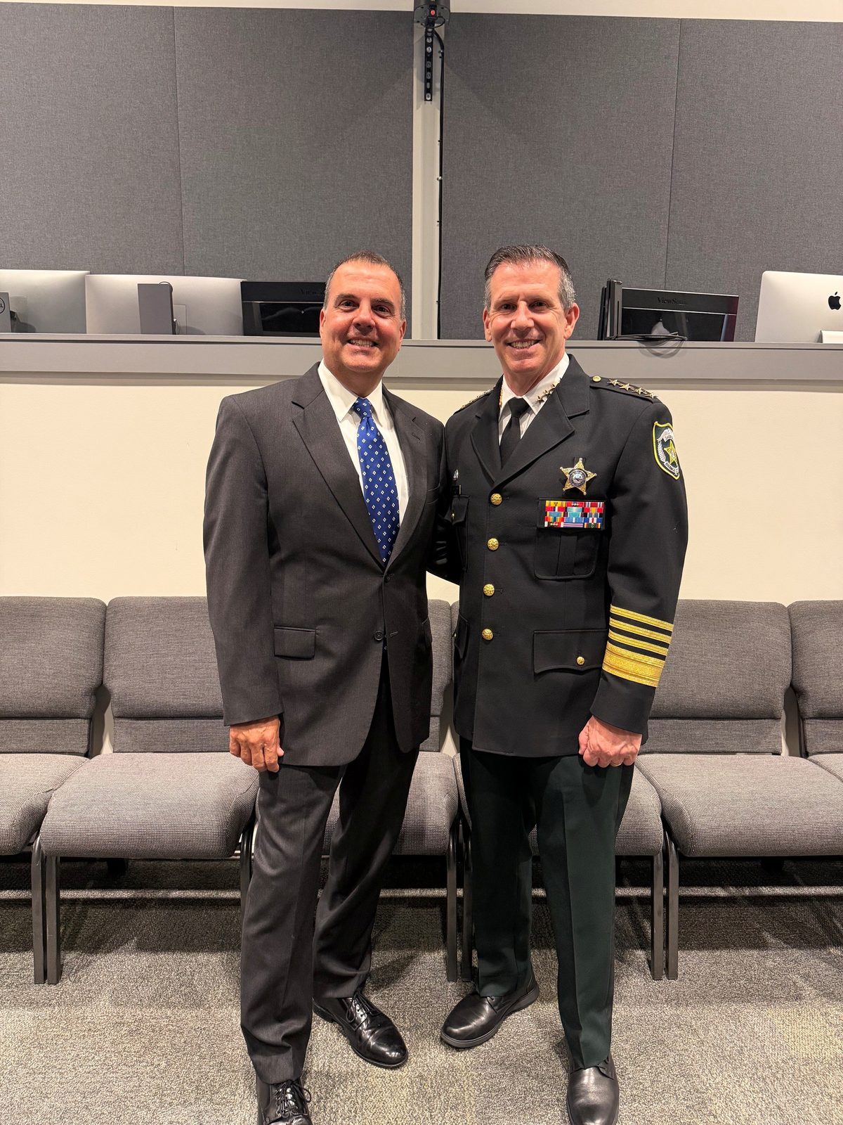 Mike Crabb with Orange County Sheriff John Mina